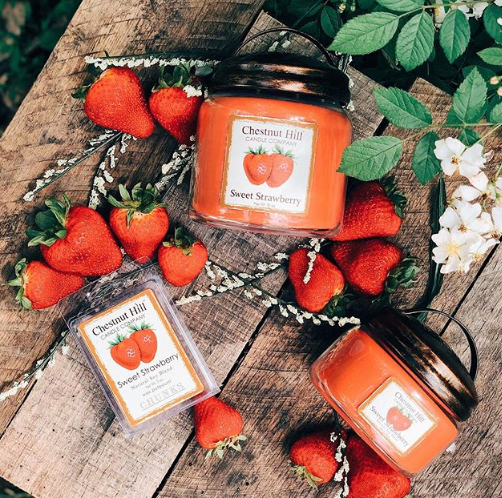 Sweet strawberry candles with custom labels.