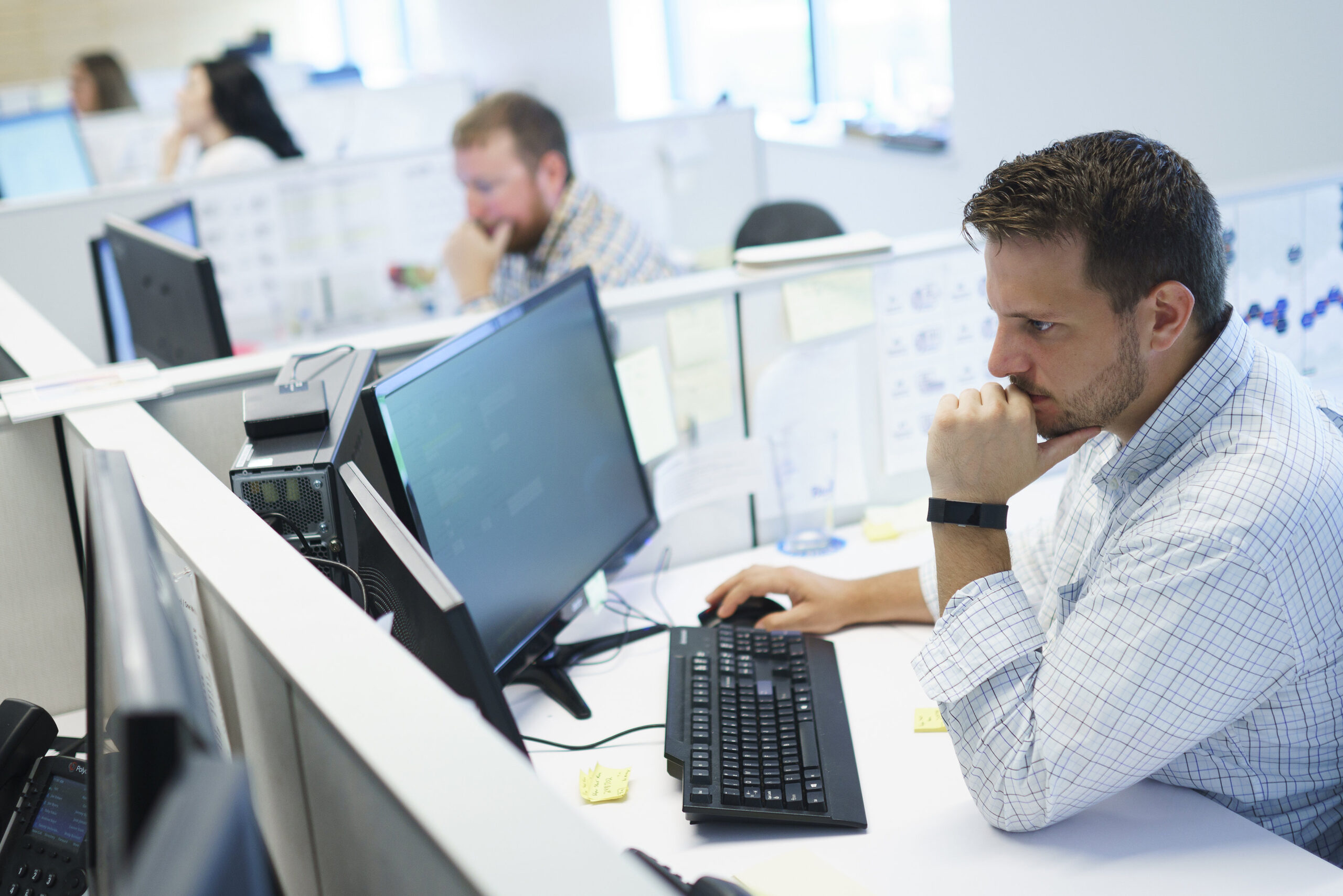 Employees at a label printing company reviewing labels with health claims.