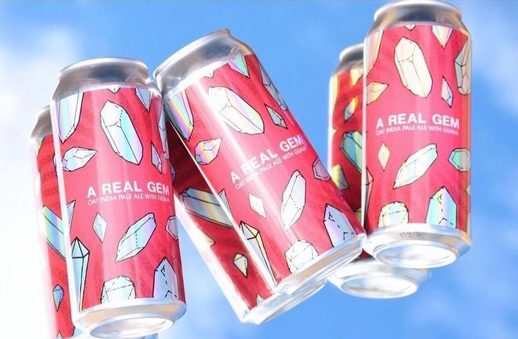 A six pack made with holographic labels.