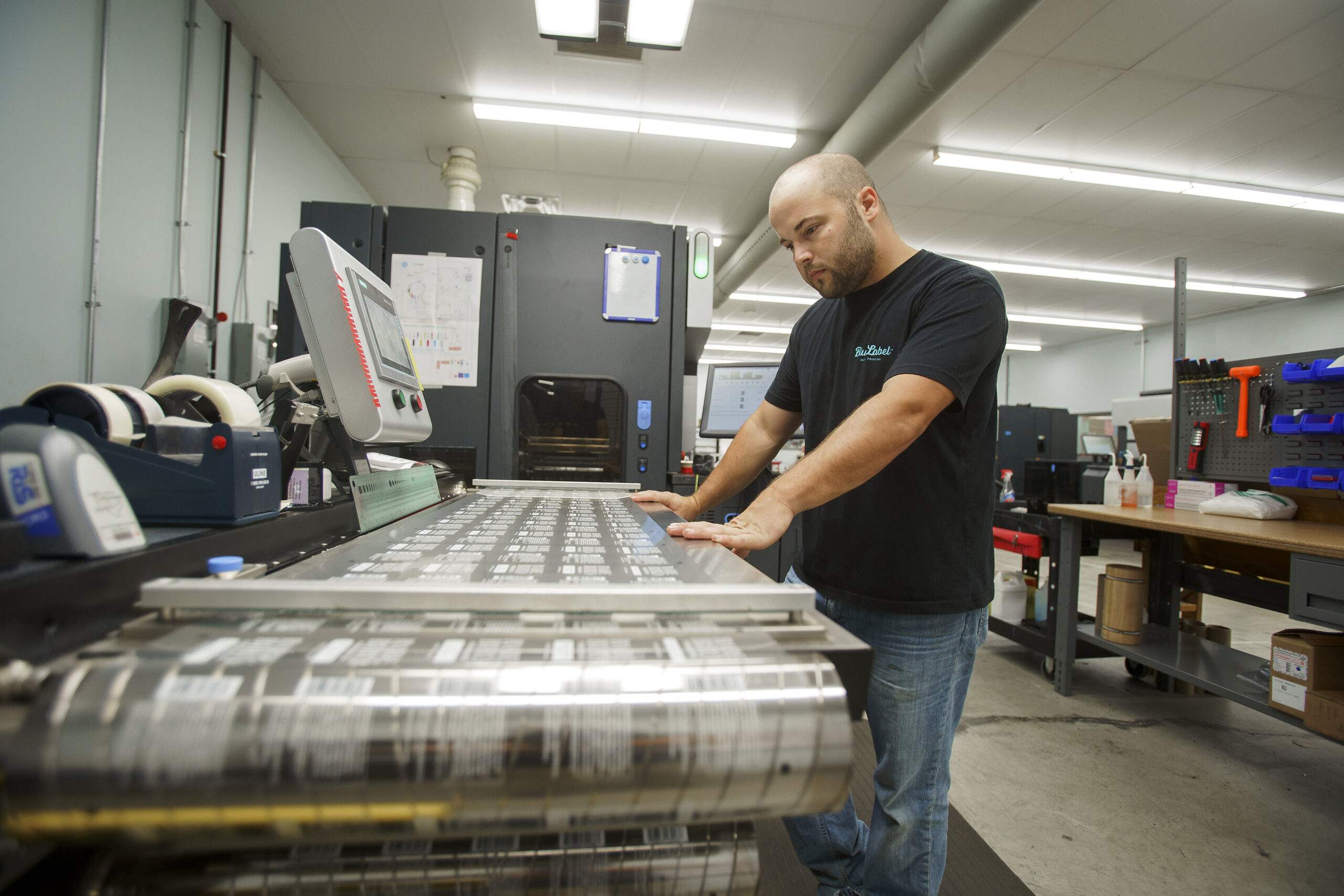 Clear labels being printed for transparent packaging.