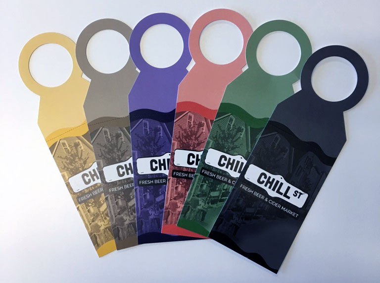 Image of variable, multi-color growler tags.