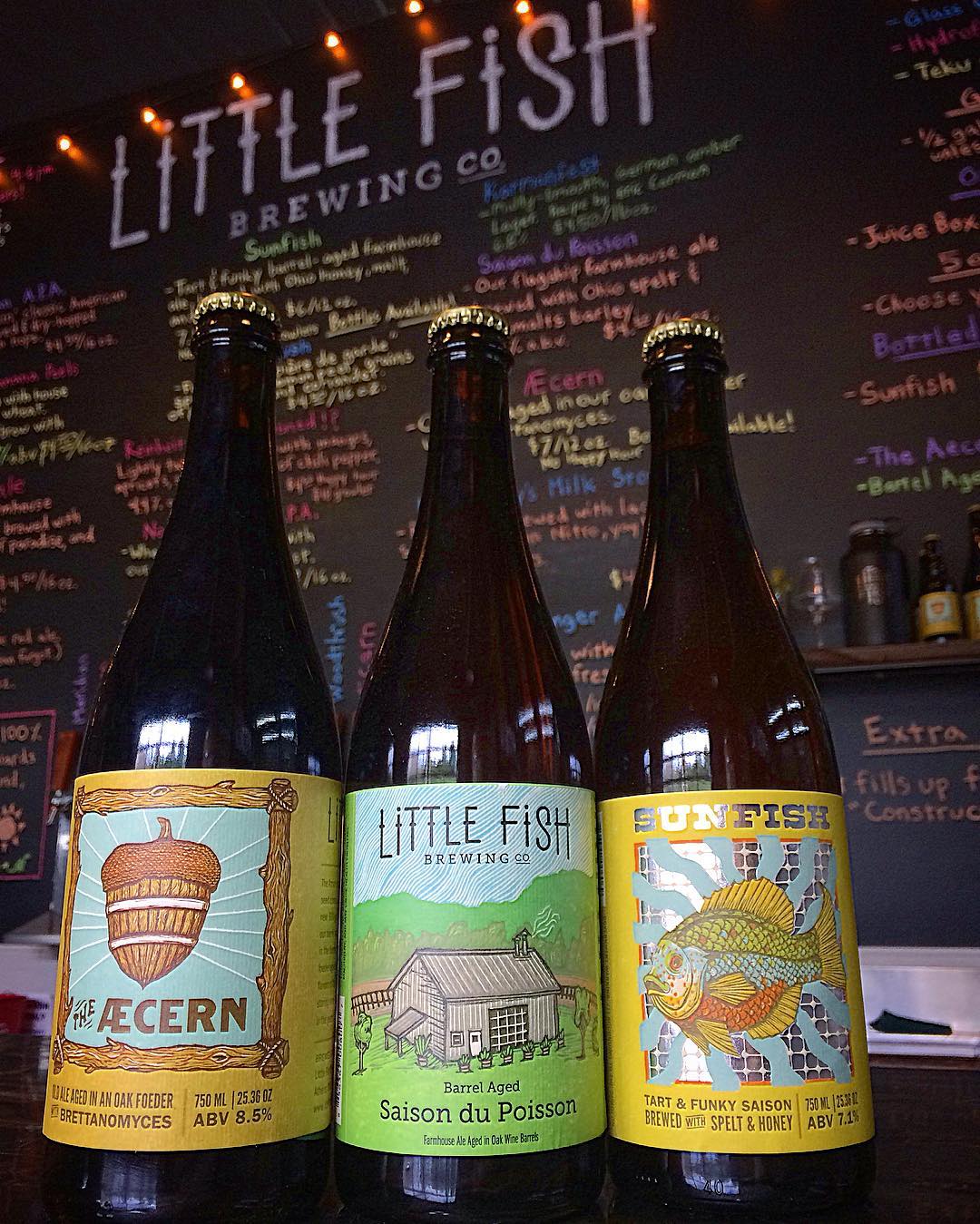 Three Little Fish Brewing beer bottles with colorful custom beer labels